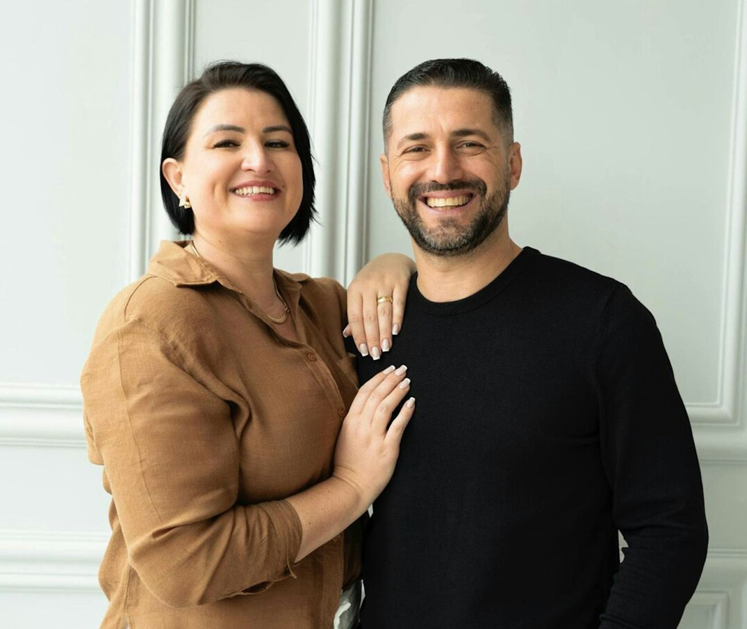 celebrity couple smiling together